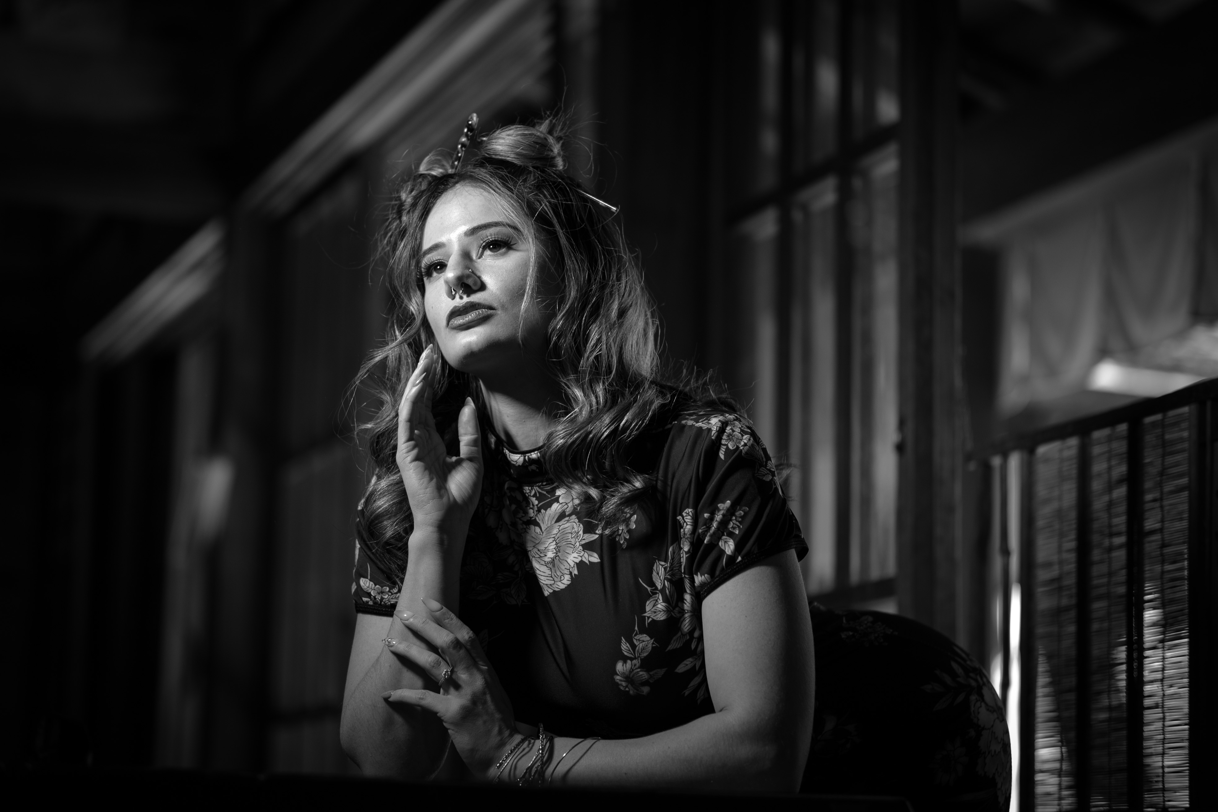Moody black-and-white portrait with dramatic lighting